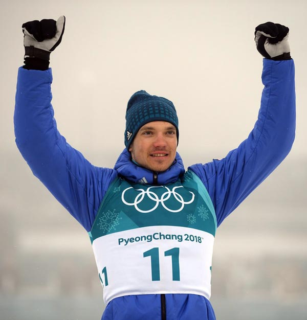 лыжник Андрей Ларьков