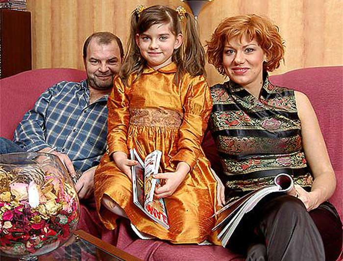 Елена Бирюкова и Алексей Литвин с дочерью